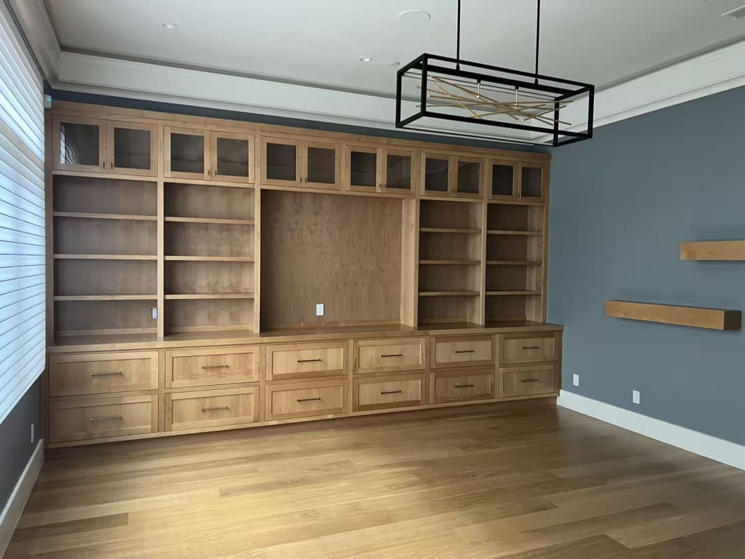 Built-in shelving with wood finish