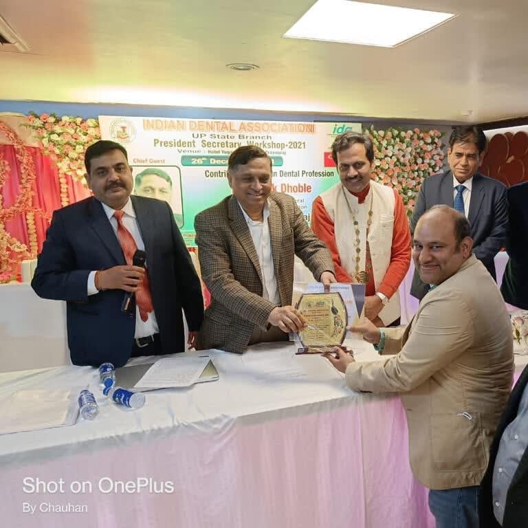 Dr. Shrawan receiving award