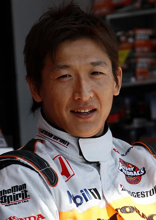 井出有治