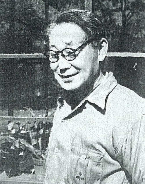 山口長男