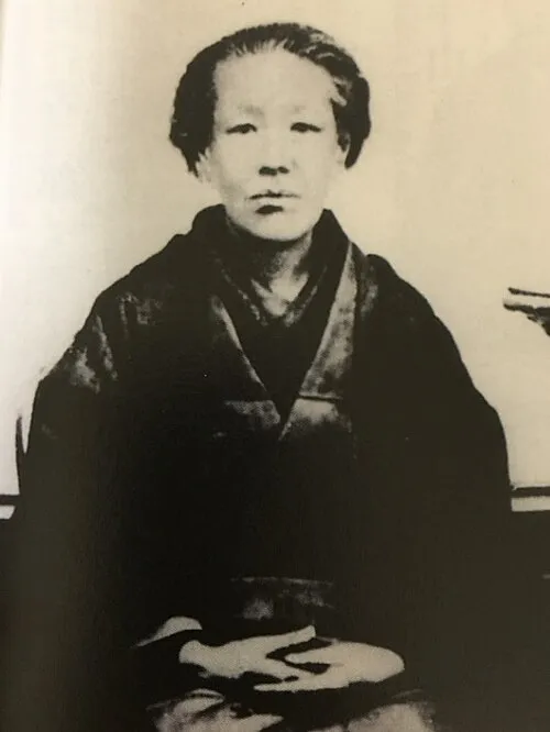 松井つね