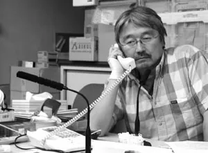 長井健司
