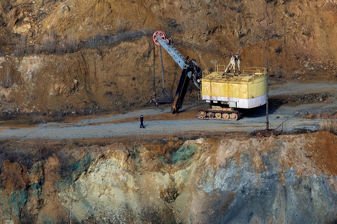 Workers at Zavallievsky Graphite survey the open pit mine amid Russia’s attack on Ukraine in Zavallia on February 10.