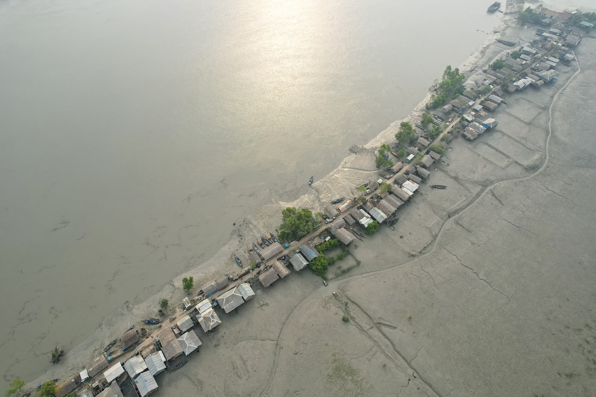 Aerial view of Kalabogi village in Bangladesh during the low tide