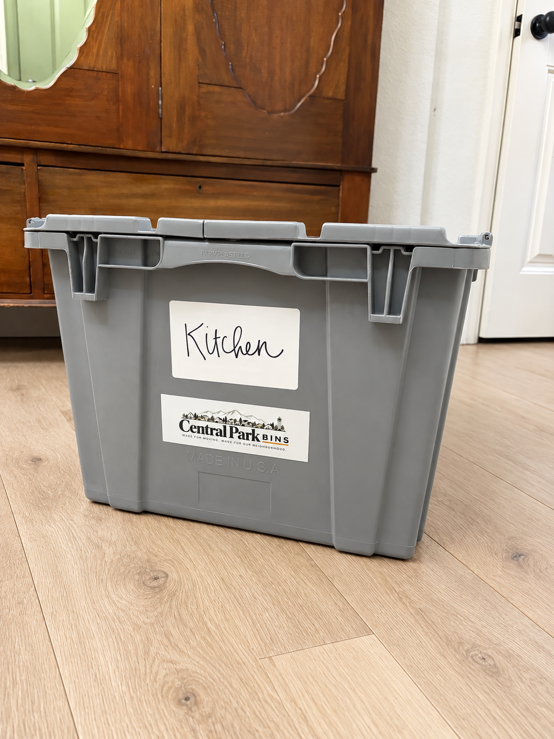 Gray reusable moving bins at a Central Park home