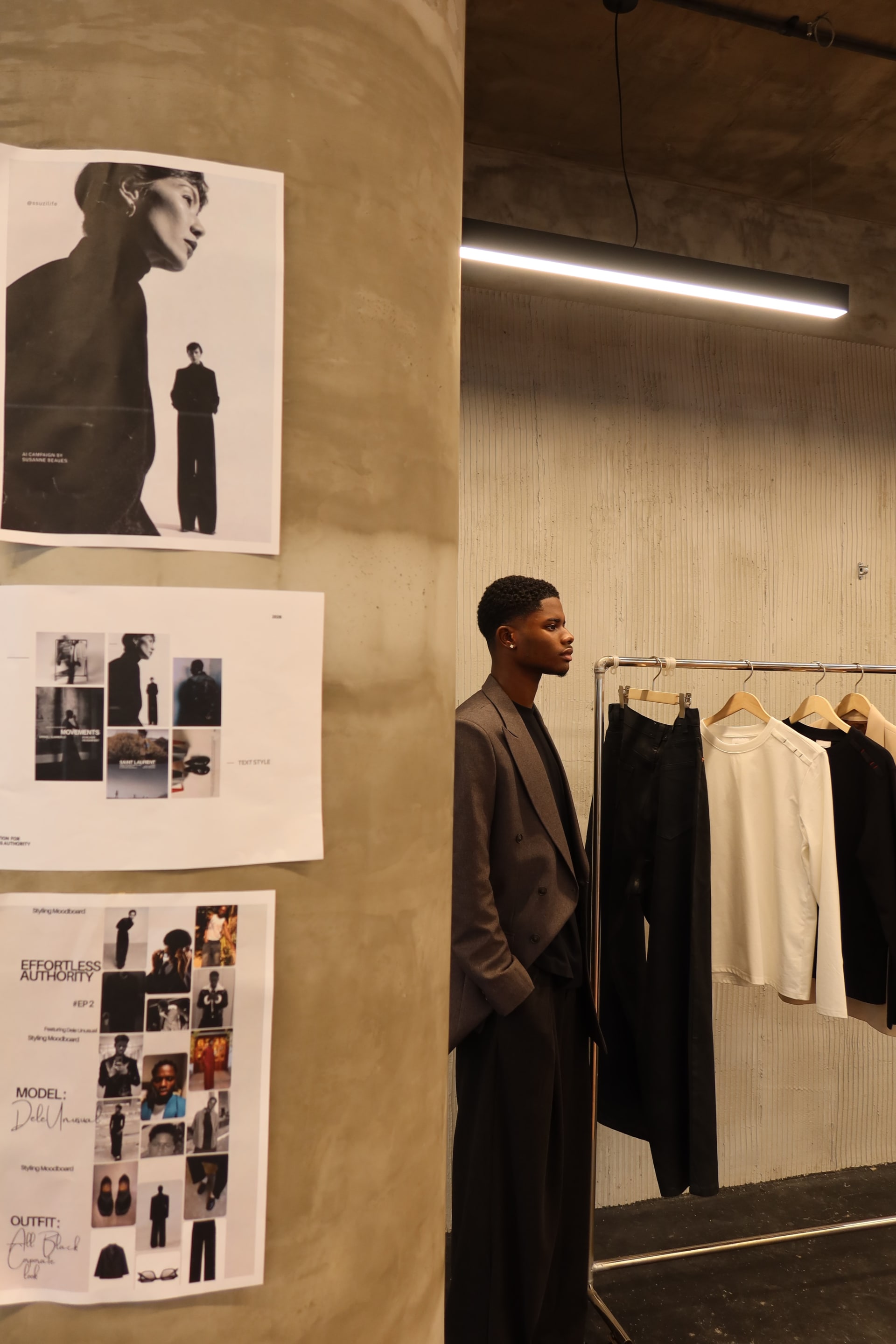 Dele in a tailored suit at a fitting