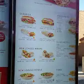 Tim Hortons storefront and interior at 300-2649 Main St Sw, Airdrie, AB