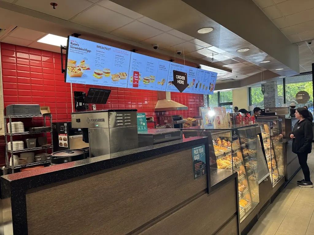 Tim Hortons storefront and interior at 100 Gopher St, Banff, AB