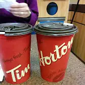 Tim Hortons storefront and interior at 100 Gopher St, Banff, AB