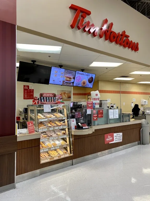 Tim Hortons storefront and interior at 100-20 Heritage Meadows, Calgary, AB