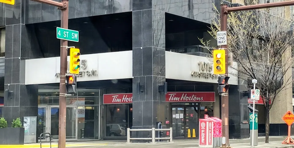 Tim Hortons storefront and interior at 1015 4th St Sw, Calgary, AB