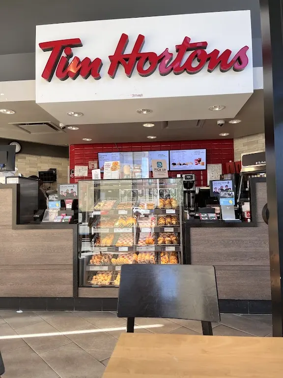 Tim Hortons storefront and interior at 117 1323 Centre St North, Calgary, AB