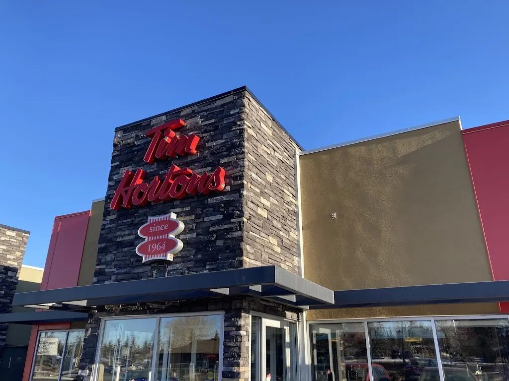 Tim Hortons storefront and interior at 347 Southland Dr, Calgary, AB