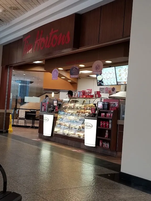Tim Hortons storefront and interior at 401 9th Ave Sw, Calgary, AB