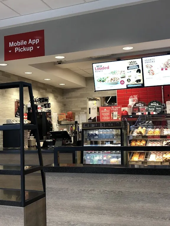 Tim Hortons storefront and interior at 665 8th St Sw, Calgary, AB