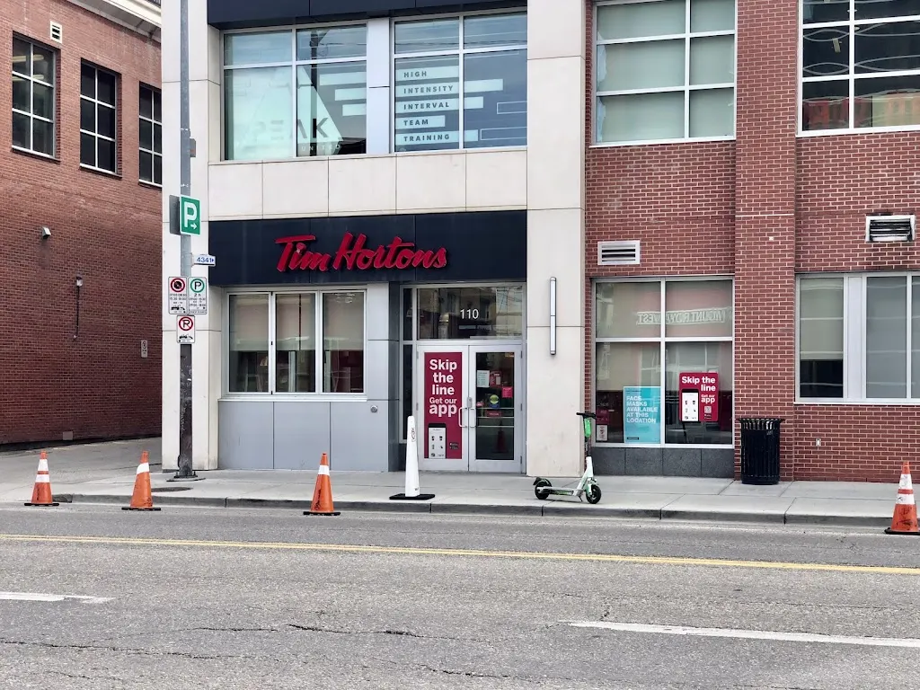 Tim Hortons storefront and interior at 880 16th Ave Sw, Calgary, AB