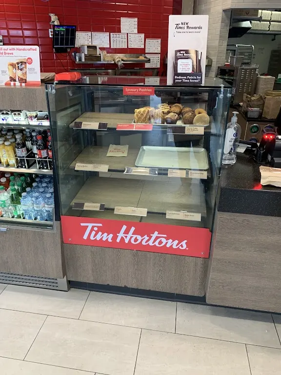 Tim Hortons storefront and interior at 924 16th Ave Nw, Calgary, AB