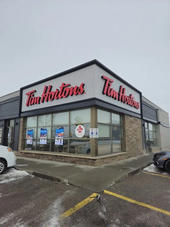 Tim Hortons storefront and interior at 2021 Pegasus Rd Ne, Calgary, AB