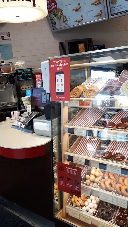 Tim Hortons storefront and interior at 3508 37th St Sw, Calgary, AB
