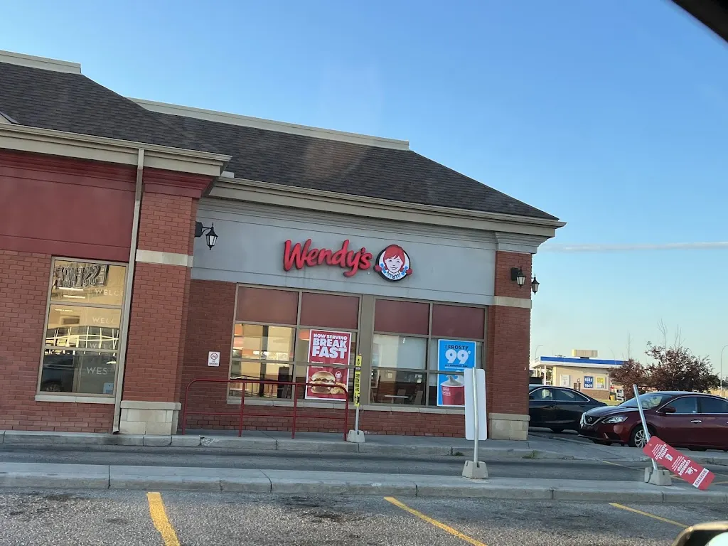 Tim Hortons storefront and interior at 3660 Westwinds Dr Ne, Calgary, AB