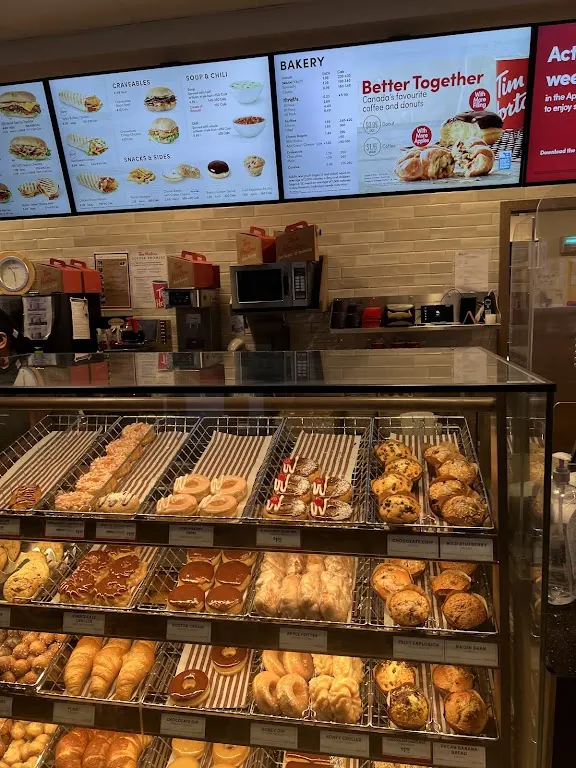 Tim Hortons storefront and interior at 3800 Memorial Dr Ne, Calgary, AB