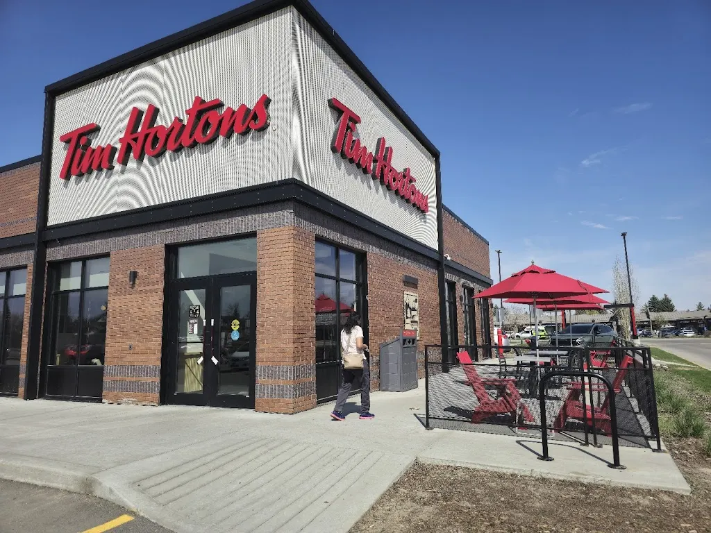 Tim Hortons storefront and interior at 8338 18th St Se, Calgary, AB