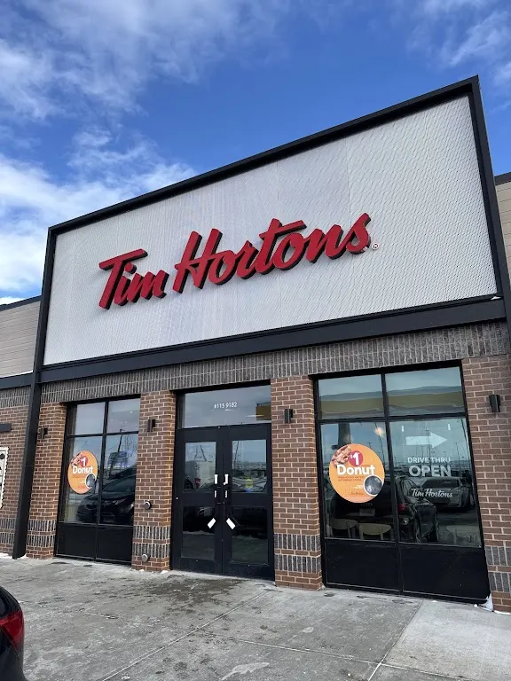 Tim Hortons storefront and interior at Unit 115 9182 Airport Link Ne, Calgary, AB