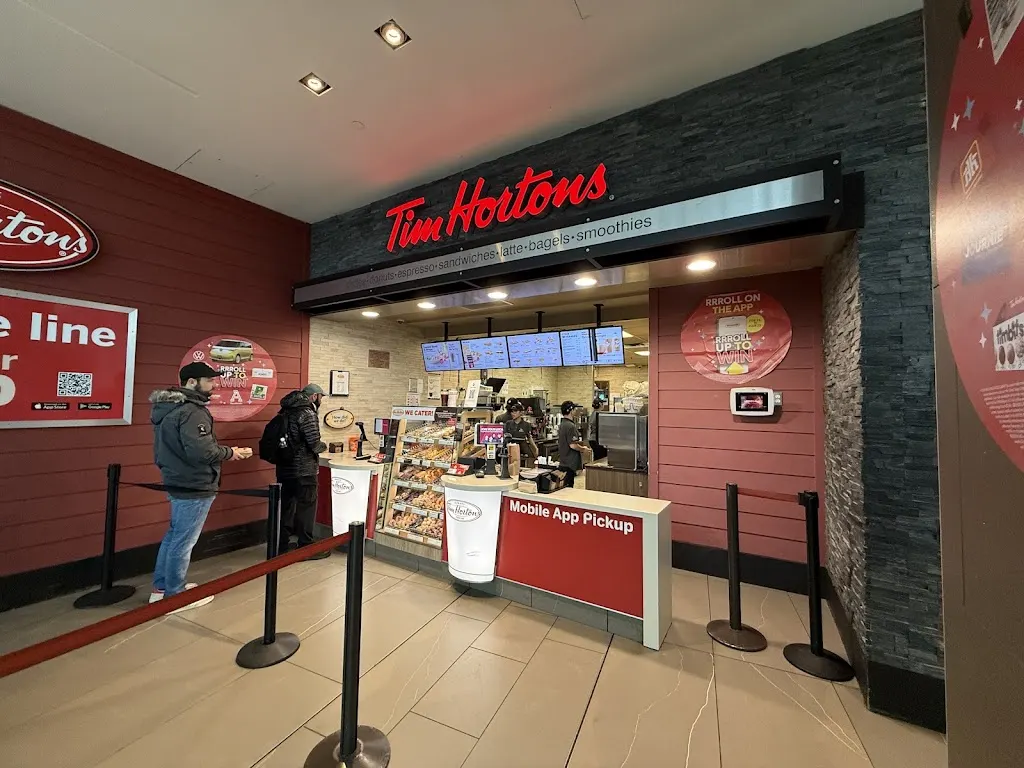 Tim Hortons storefront and interior at Dome Tower, 324 7 Ave Sw, Calgary, AB