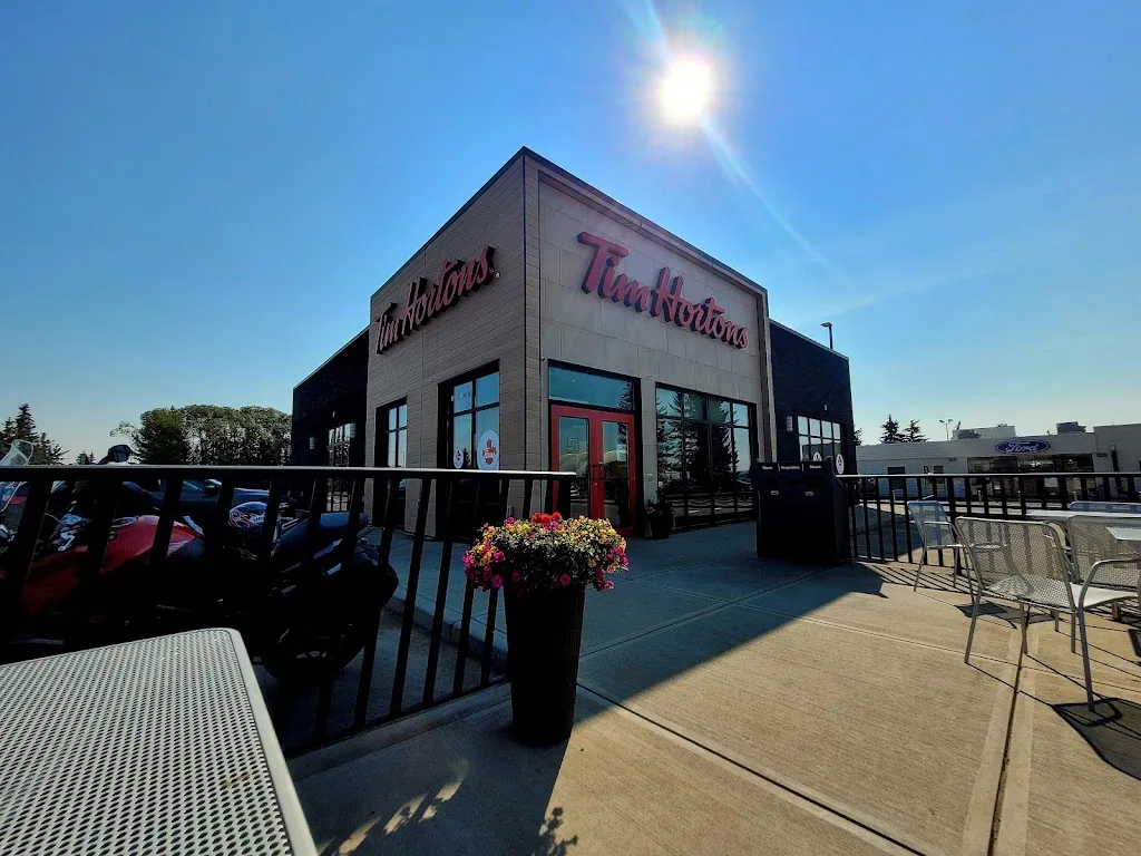 Tim Hortons storefront and interior at 15 Champion Rd, Carstairs, AB