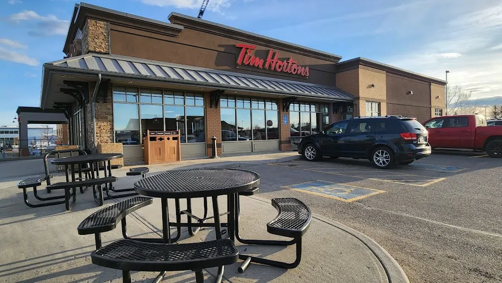Tim Hortons storefront and interior at 12 West Side Dr, Cochrane, AB