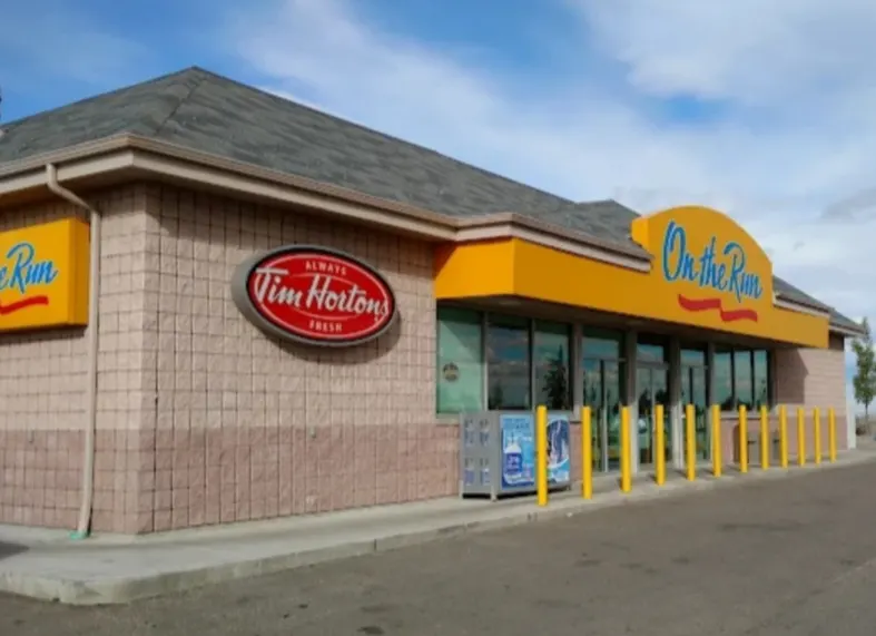 Tim Hortons storefront and interior at Queen Elizabeth Ii Highway, Crossfield, AB