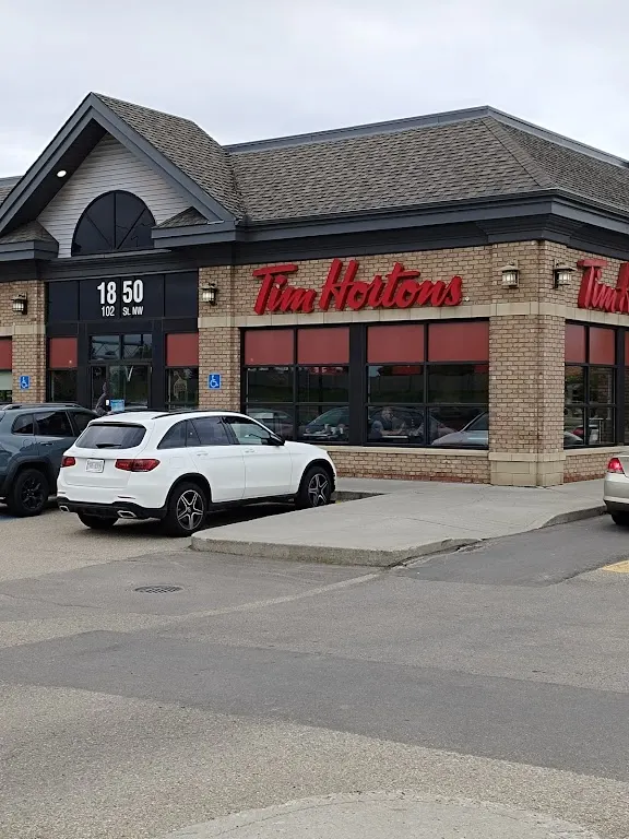 Tim Hortons storefront and interior at 1850 102 St Nw, Edmonton, AB