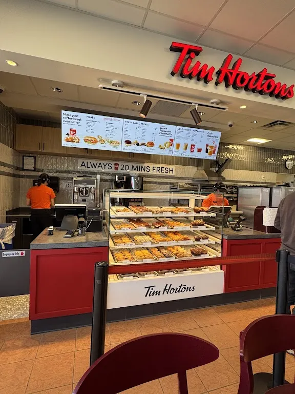 Tim Hortons storefront and interior at 11103 Ellerslie Rd Sw, Edmonton, AB