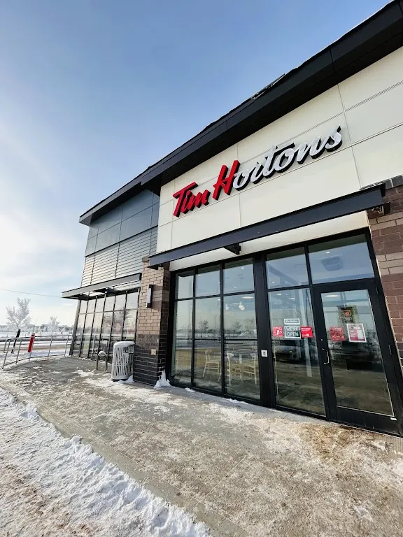 Tim Hortons storefront and interior at Manning Dr Nw &amp; 153rd Ave Nw, Edmonton, AB