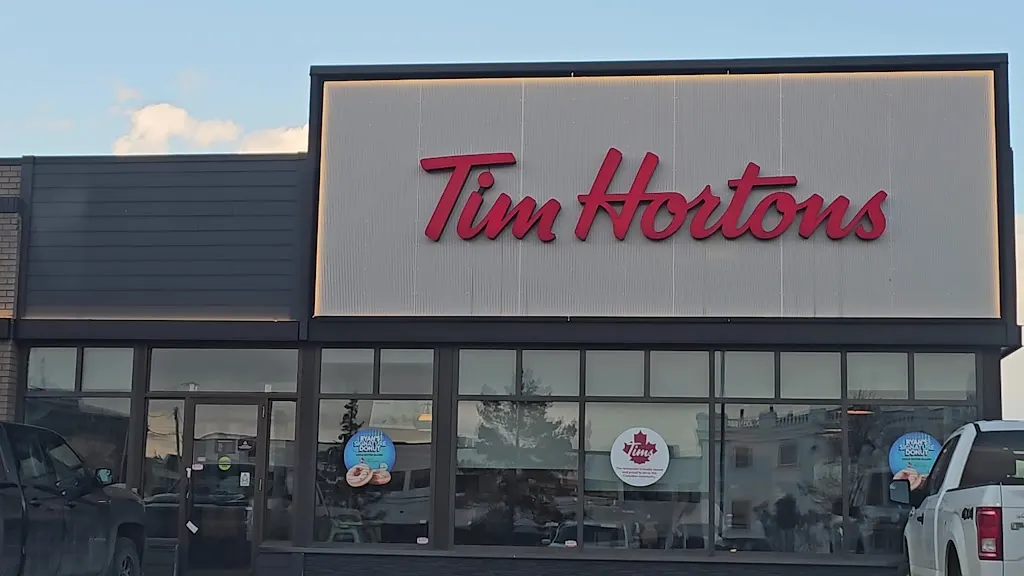 Tim Hortons storefront and interior at 10206 100th St, Grande Prairie, AB