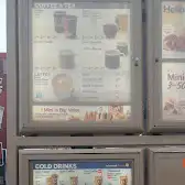 Tim Hortons storefront and interior at 10206 100th St, Grande Prairie, AB