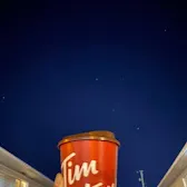 Tim Hortons storefront and interior at 10206 100th St, Grande Prairie, AB