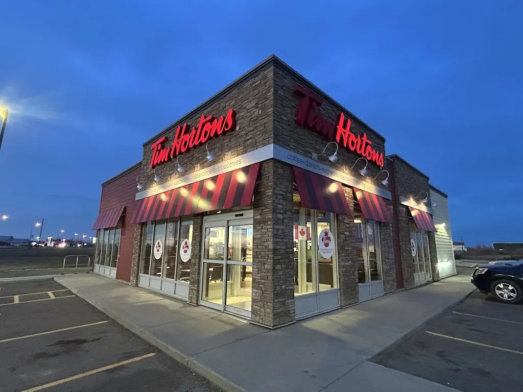 Tim Hortons storefront and interior at 606 West Industrial Road, Hanna, AB