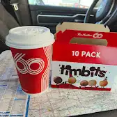 Tim Hortons storefront and interior at 606 West Industrial Road, Hanna, AB