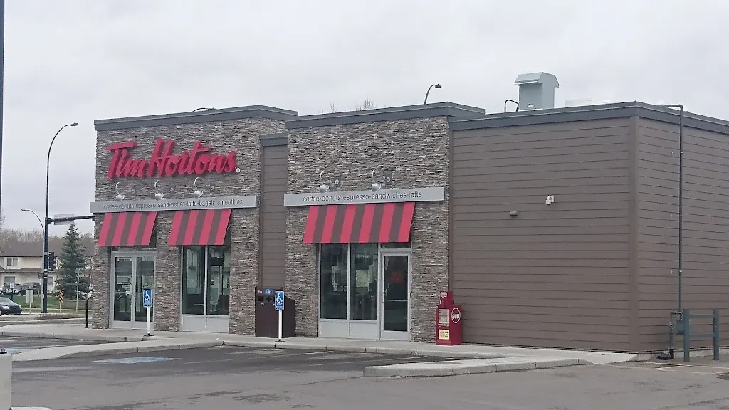 Tim Hortons storefront and interior at 100 High Country Dr Nw, High River, AB