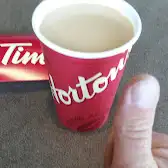 Tim Hortons storefront and interior at 100 High Country Dr Nw, High River, AB