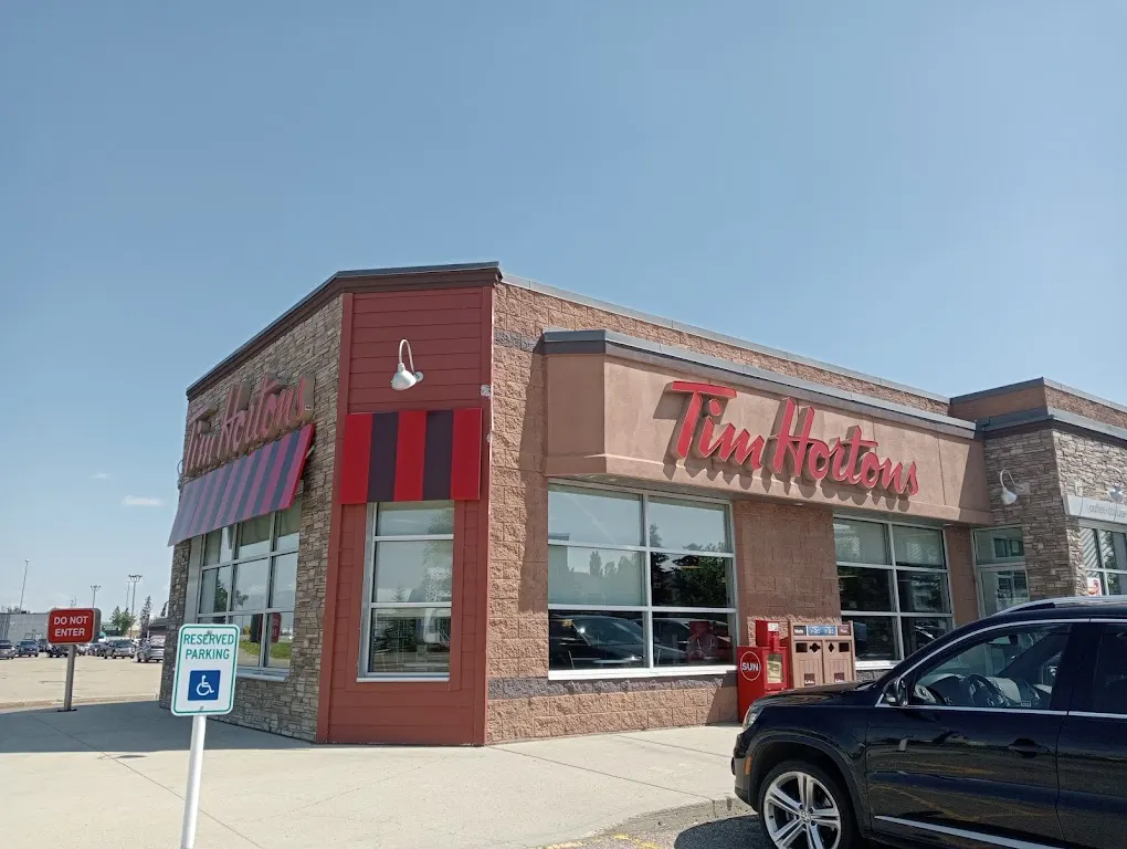 Tim Hortons storefront and interior at 4411 50th St, Innisfail, AB