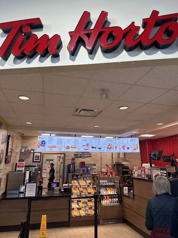Tim Hortons storefront and interior at 100 Nakoda Way, Kananaskis, AB