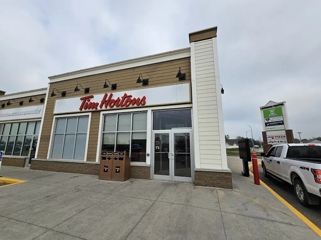 Tim Hortons storefront and interior at 97 Centre St, Langdon, AB