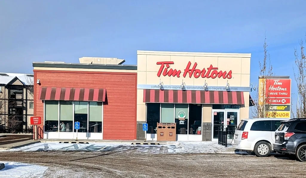 Tim Hortons storefront and interior at 115 Sunridge Road West, Lethbridge, AB