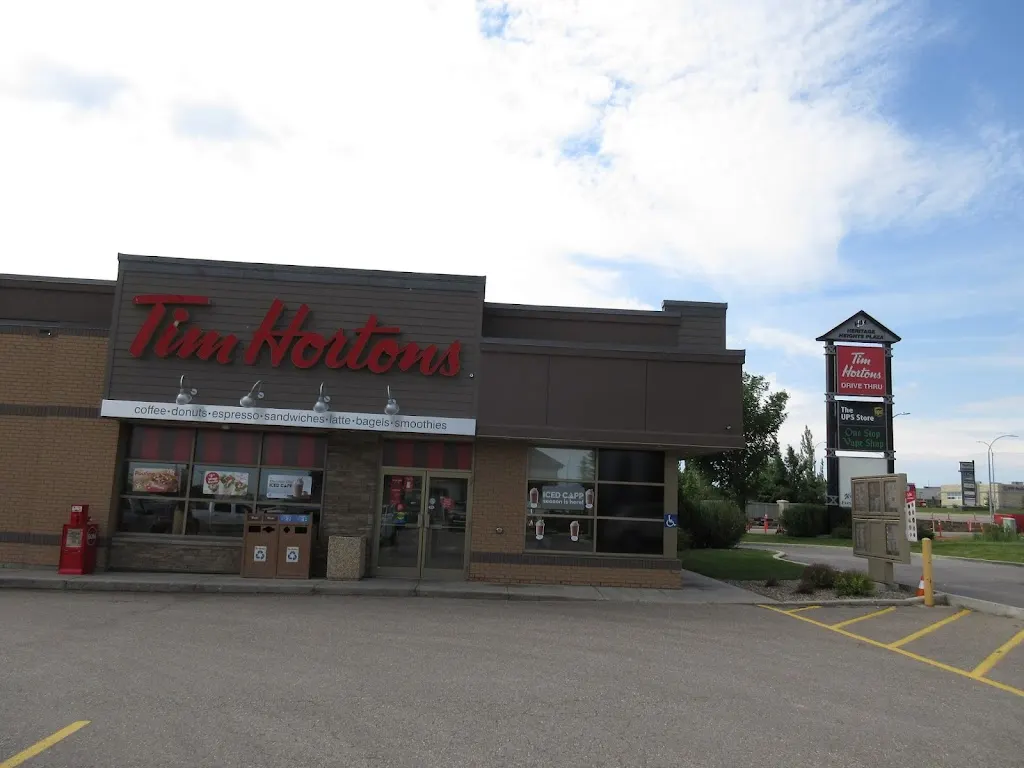Tim Hortons storefront and interior at 442 Scenic Dr, Lethbridge, AB