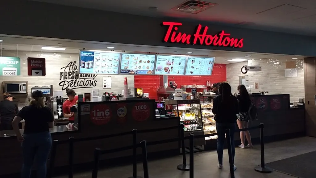 Tim Hortons storefront and interior at 4401 University Dr W, Lethbridge, AB