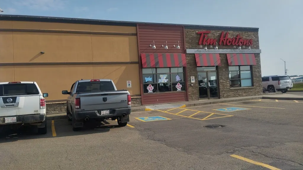 Tim Hortons storefront and interior at 8809 100th St, Morinville, AB