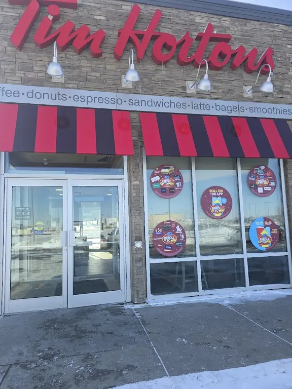 Tim Hortons storefront and interior at 2707 20a Ave,, Nanton, AB