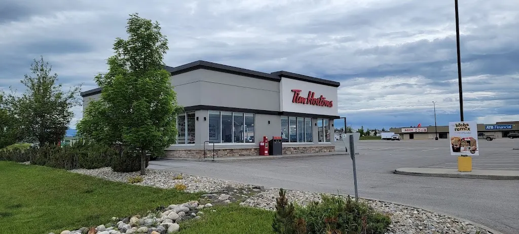 Tim Hortons storefront and interior at 1300 Hewetson Avenue, Pincher Creek, AB